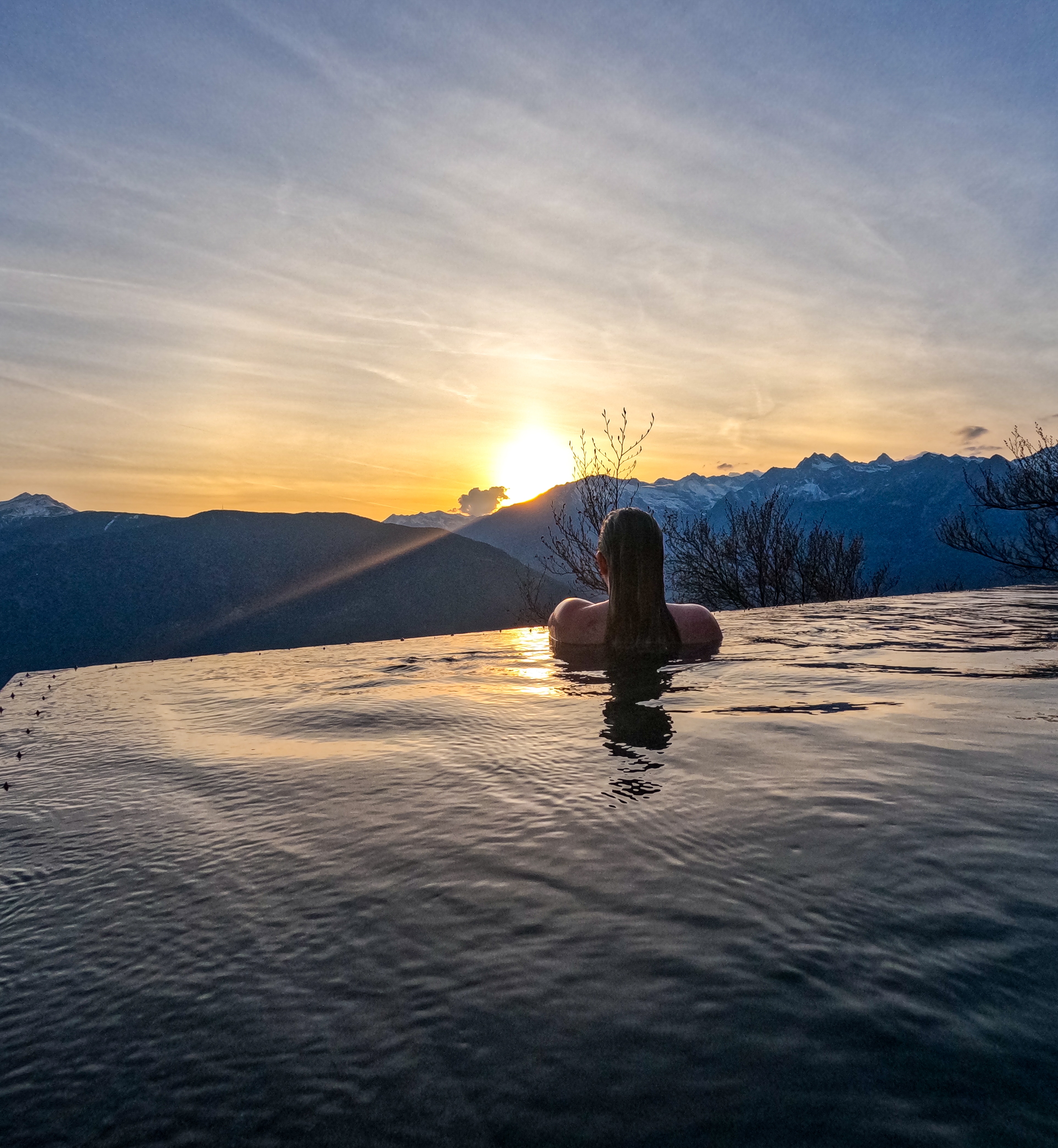 miramonti boutique hotel italy infinity pool at sunset