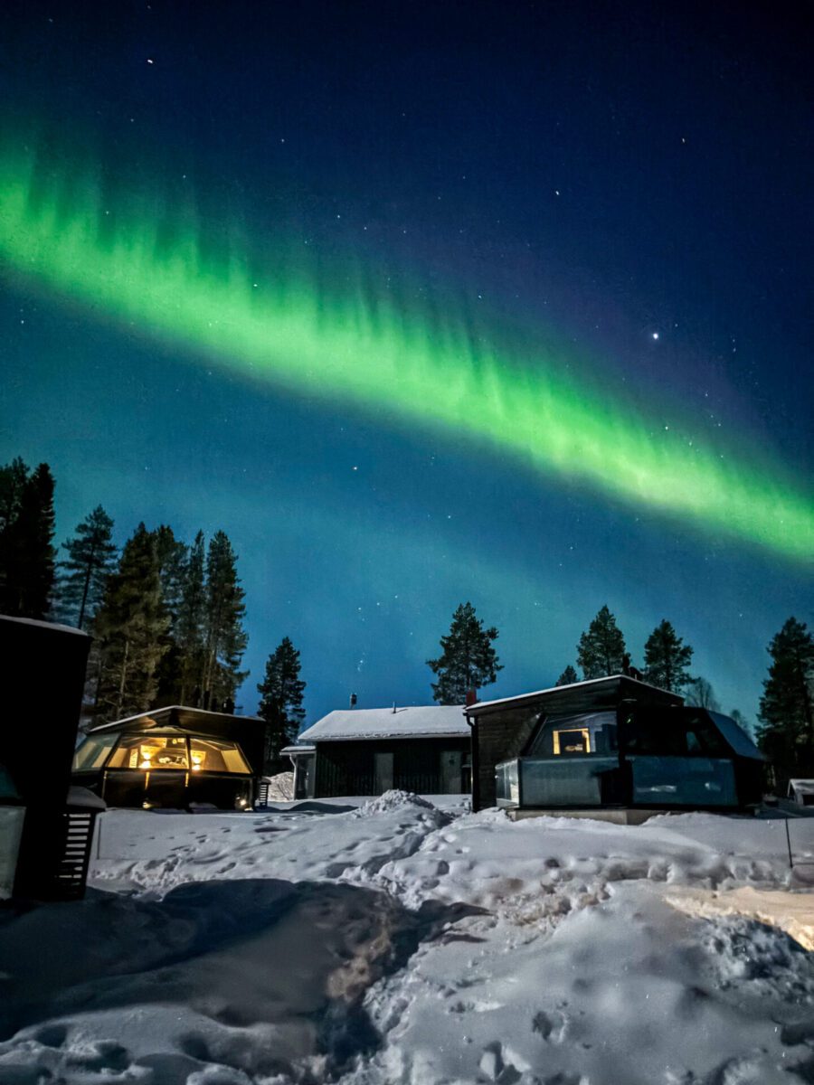 Northern Lights over Glass Igloo Lapland Finland